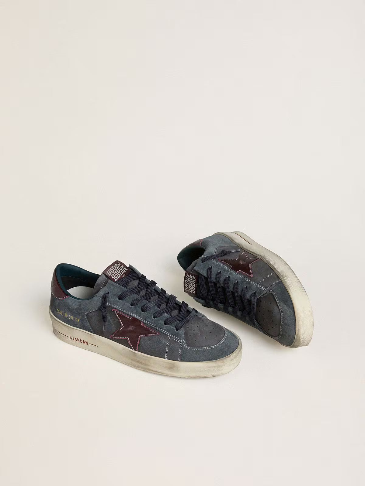 Golden Goose Heren Stardan LTD in antraciet nubuck en blauw suède met metalen leren ster