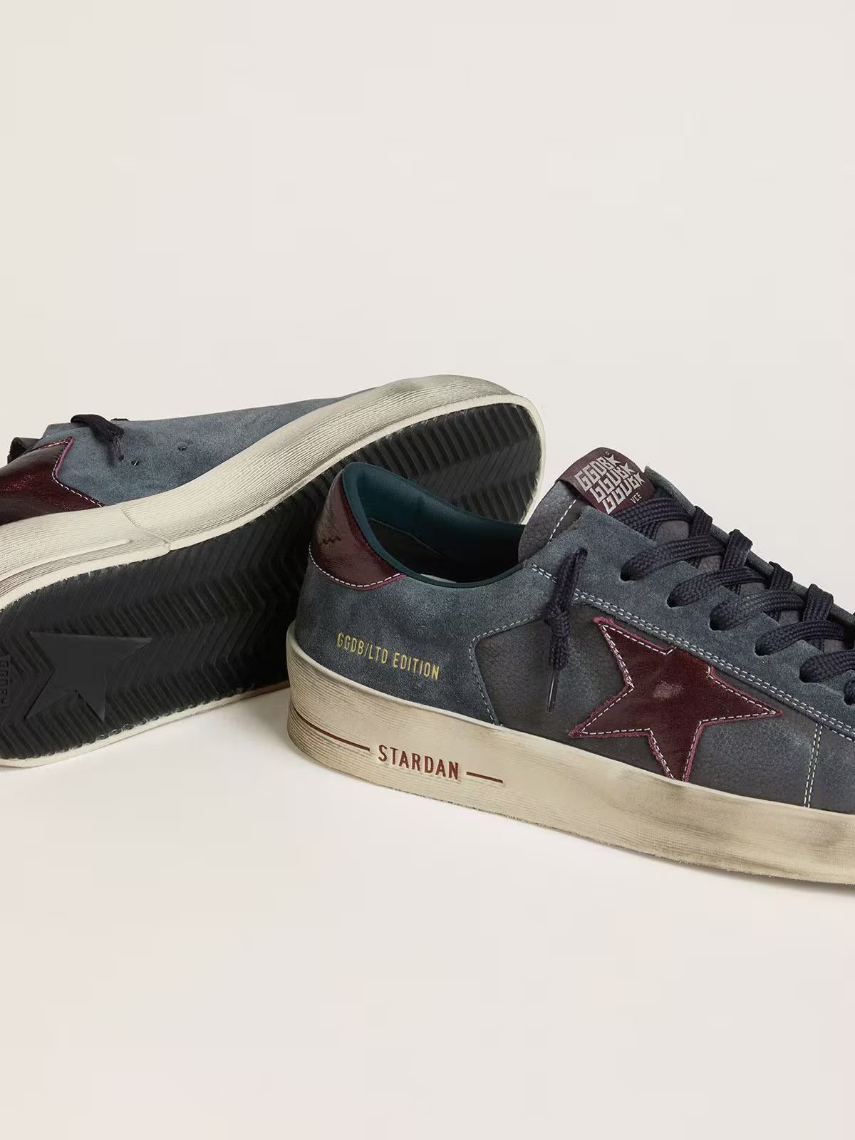 Golden Goose Heren Stardan LTD in antraciet nubuck en blauw suède met metalen leren ster