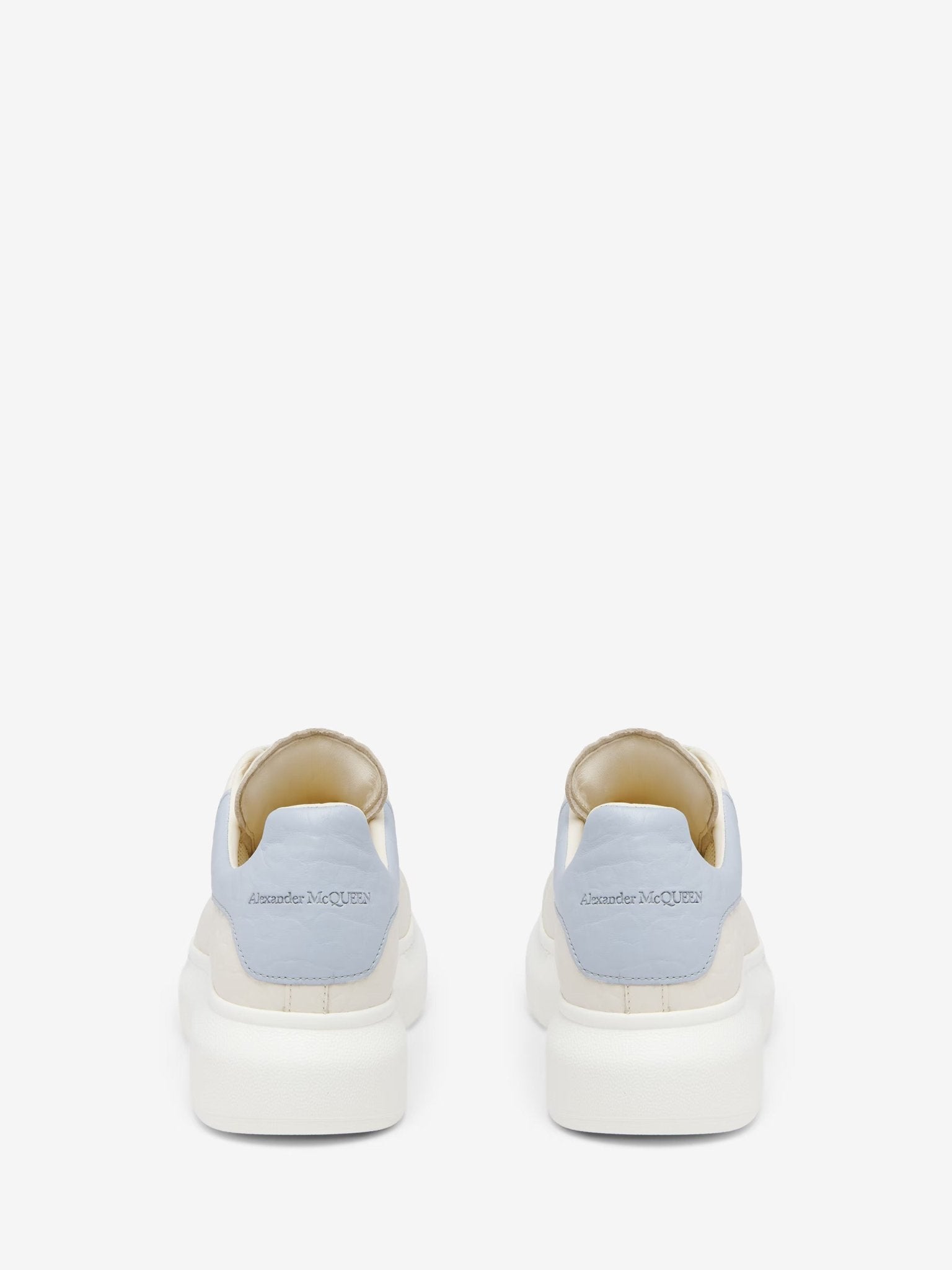 Alexander McQueen Women's Oversized Sneaker in Off White/Light Blue - Dani Dyers