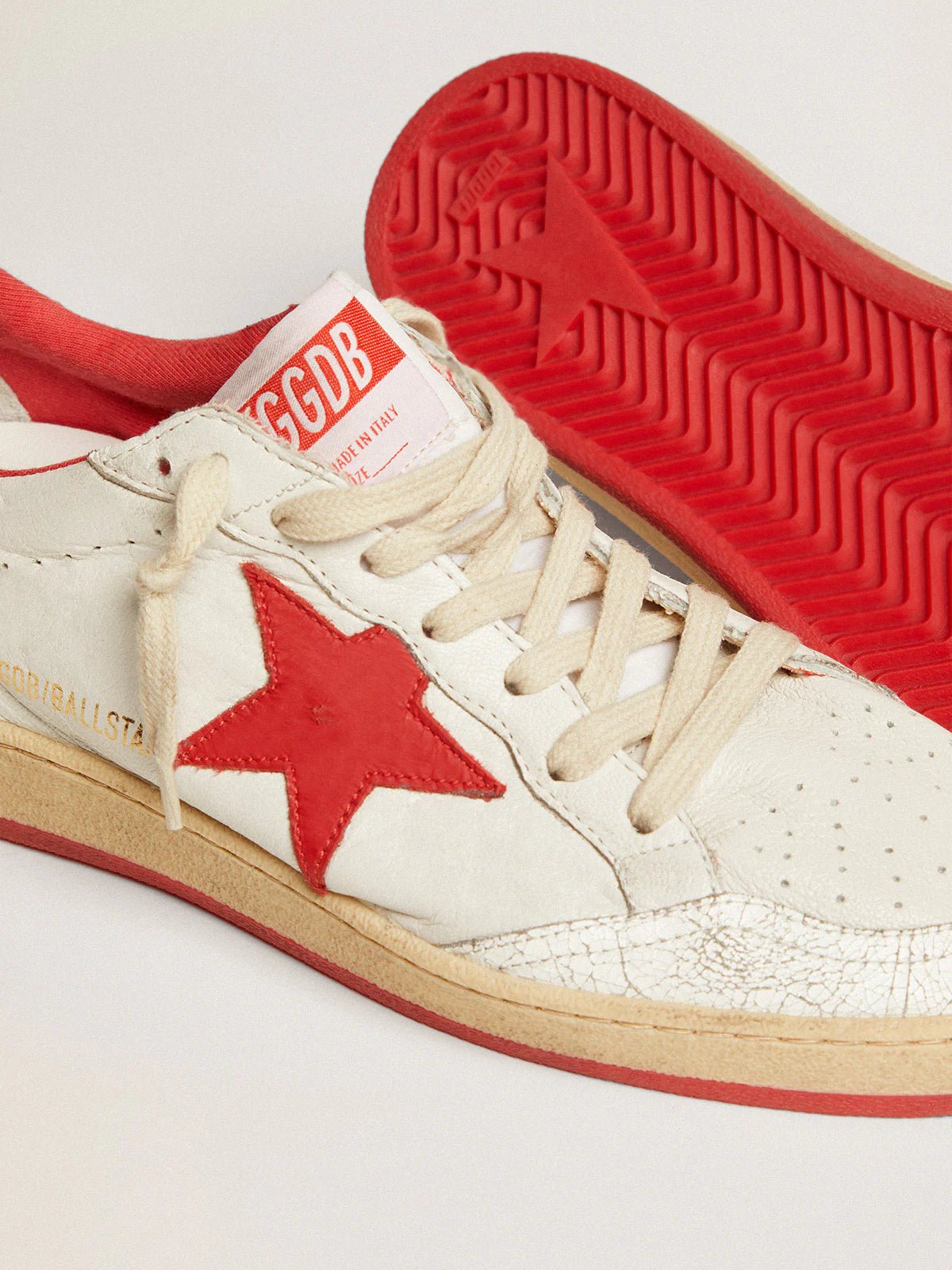Golden Goose Women's Ball Star in white leather with red star and heel tab - Dani Dyers
